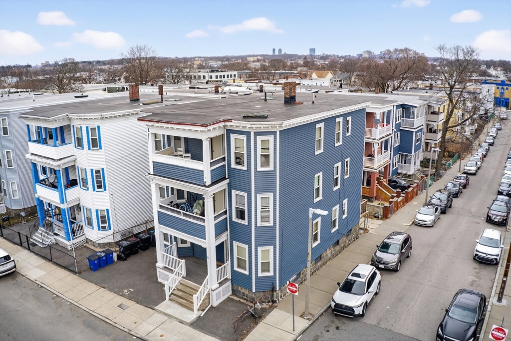 64 Woolson St, Boston, Massachusetts, 12 Bedrooms Bedrooms, 18 Rooms Rooms,3 BathroomsBathrooms,Residential Income,For Sale,Woolson St,73490834