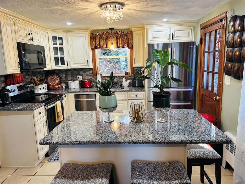 45 Decker St, Milton, Massachusetts, 4 Bedrooms Bedrooms, 7 Rooms Rooms,1.5 BathroomsBathrooms,Residential,For Sale,Decker St,73370482